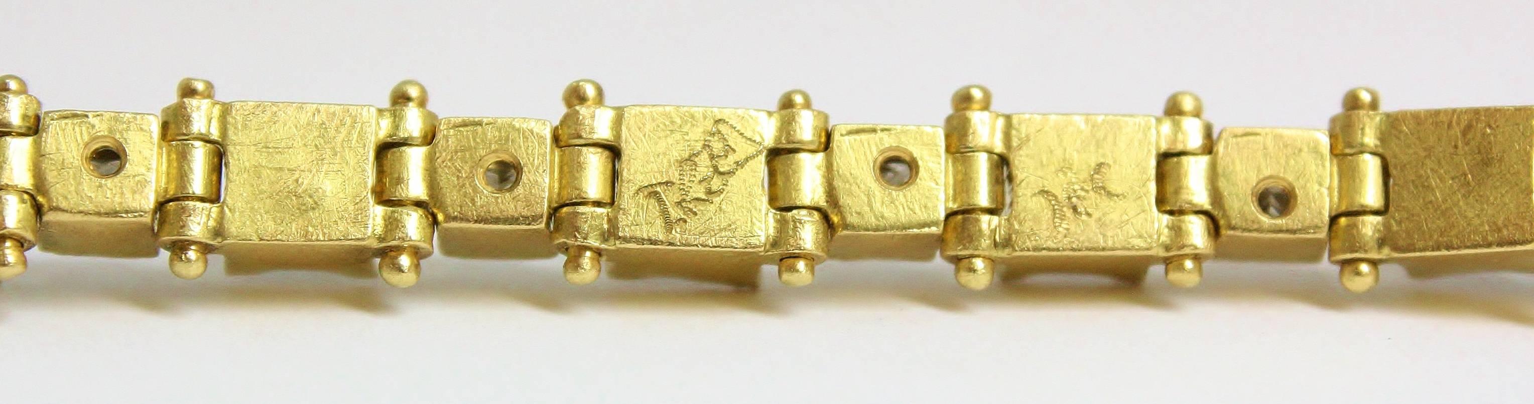 This authentic Todd Reed bracelet, cast from 18kt Yellow Gold, weighs 38 grams and features both Raw Diamonds Cubes and Princess Cut Diamonds. The raw diamond cubes are rough and uncut, accounting for 14.0cwt, while the princess cut diamonds account