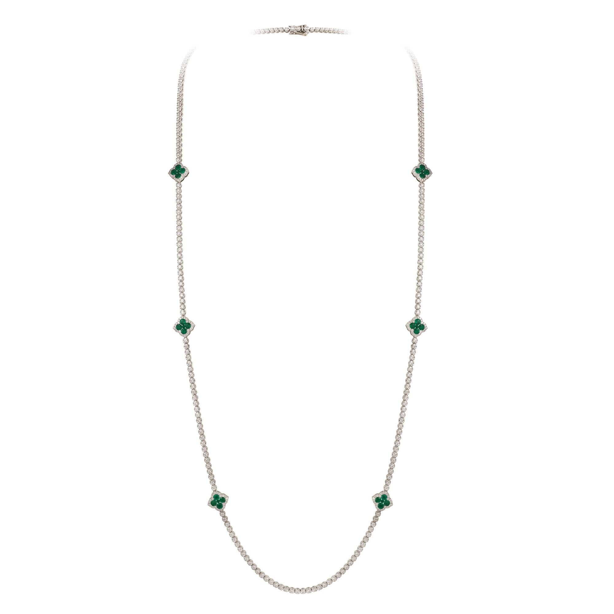 The Following Item we are offering is A Rare 18KT Gold Fancy Large Emerald Diamond Clover Necklace. Necklace is comprised of Finely Set Glittering Gorgeous Fancy Emeralds and White Diamonds forming clovers!!! The Diamonds and Emeralds are of