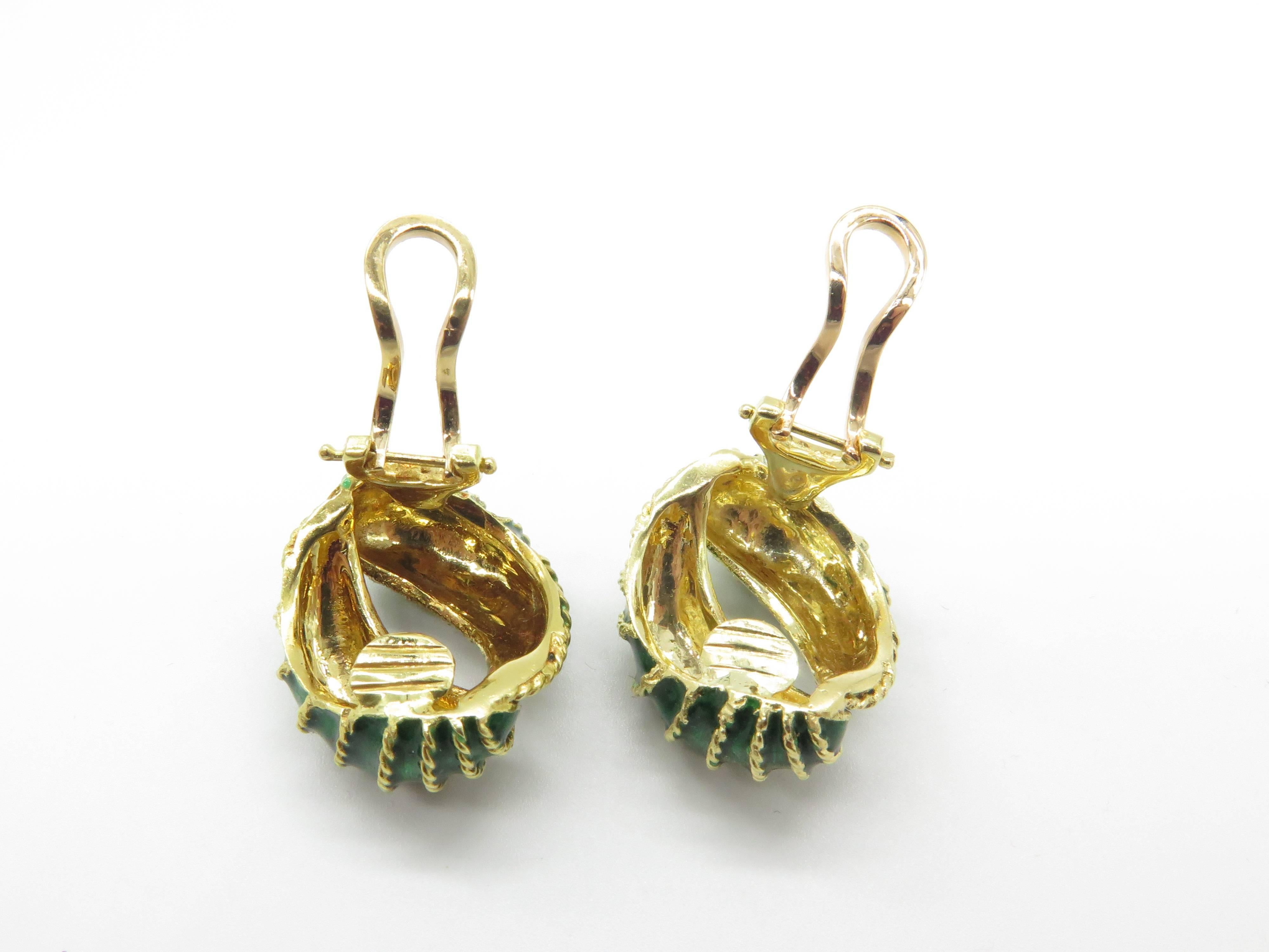18k Yellow Gold Green Enamel Earrings. These 1950's earrings are made for non pierced ears but can be easily converted for pierced ears. Measurements: 24 x 20mm, Weight: 23.1 grams. Enamel in Excellent condition.