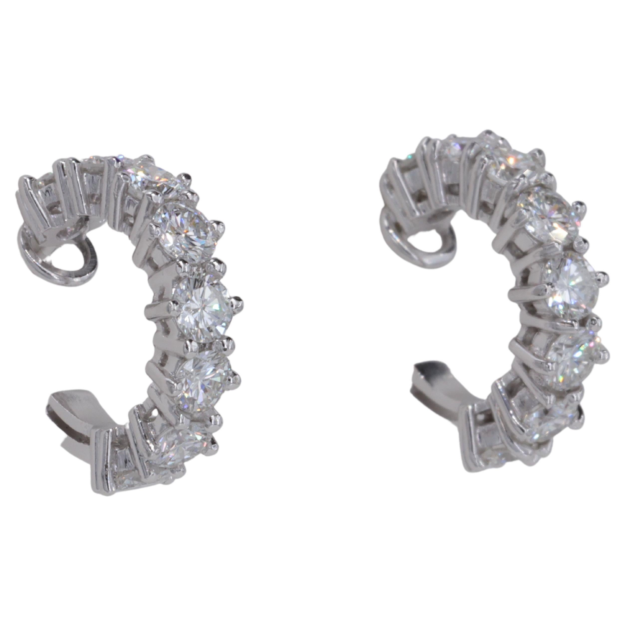 2.32 Carat Hand Fabricated Platinum and Round Brilliant Diamond Huggie Earrings 

Heirloom Quality. Extremely well made. Entirely hand fabricated from platinum. 

Diamonds: 
              
Weight - 2.32 Carats 
Colors - D to F 
Clarity - VS1 Plus