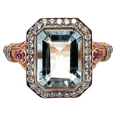 Ring aus 14 Karat Roségold mit Aquamarin im Smaragdschliff, Diamanten und Rubinen