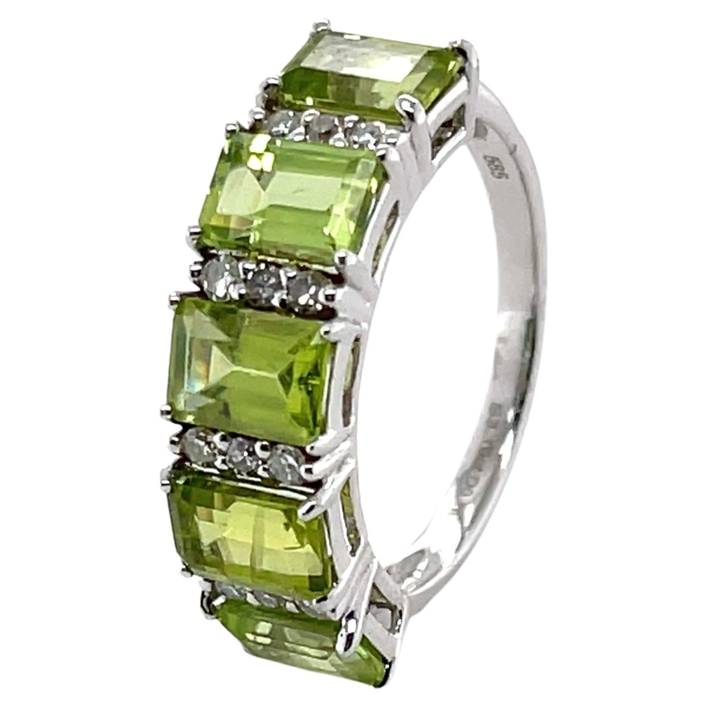 For Sale:  14ct White Gold 5 Stone Peridot and Diamond Ring