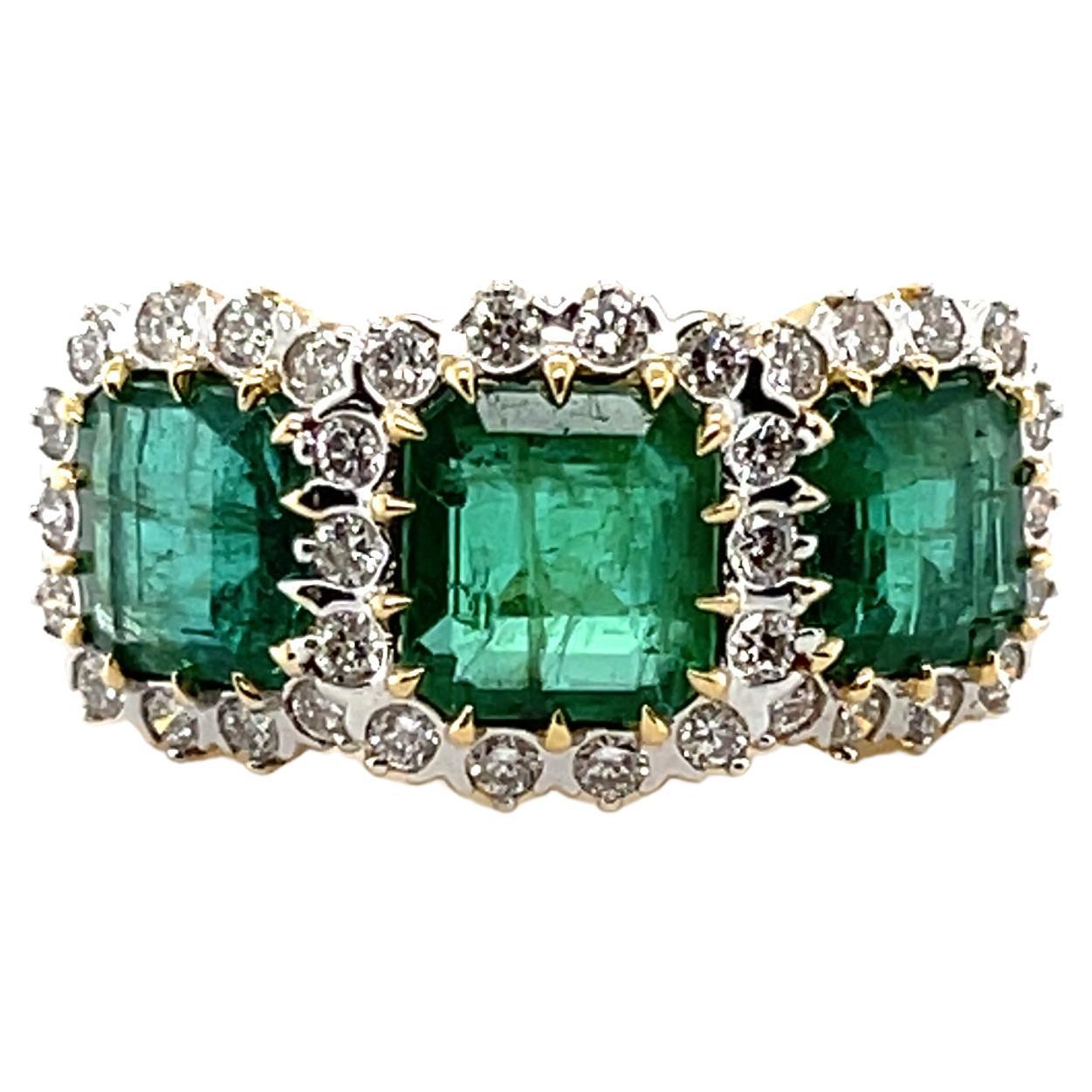 18 Karat Gelbgold Trilogie Smaragd und Diamant Ring