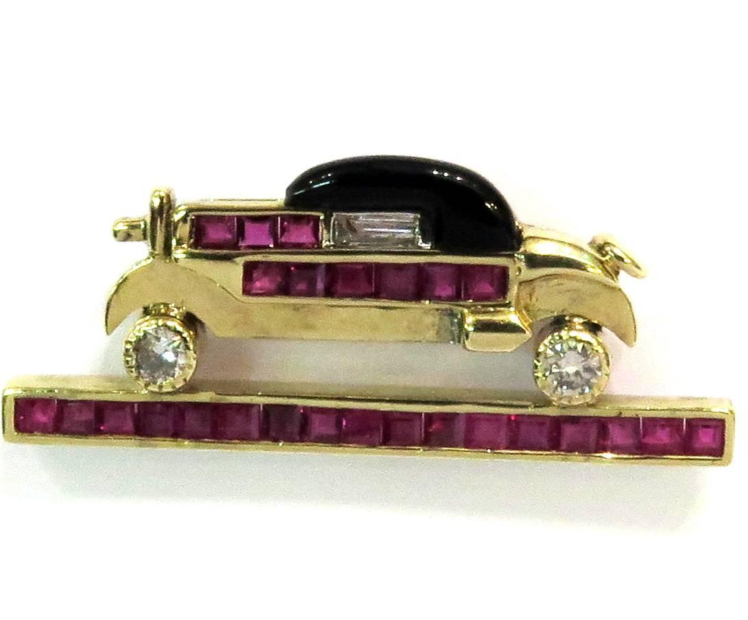 This is the perfect gift for the classic car enthusest in your life. Easily worn by man or woman.This car would make a perfect lapel pin.
There are approx 1.20ct of rubies.
There are approx .36ct diamonds
This pin weighs 6.6 grams
This pin measures