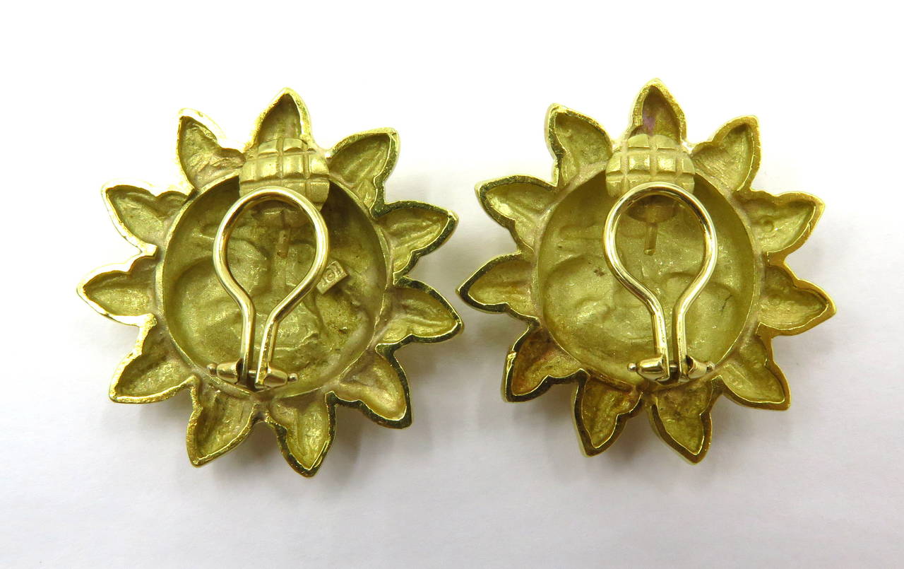 These large fabulous 18k clip earrings can easily be converted to pierced. Lots of character on these sunny faces! They are sure to bring a smile to anyone who wears or looks at them! Very comfortable to wear.