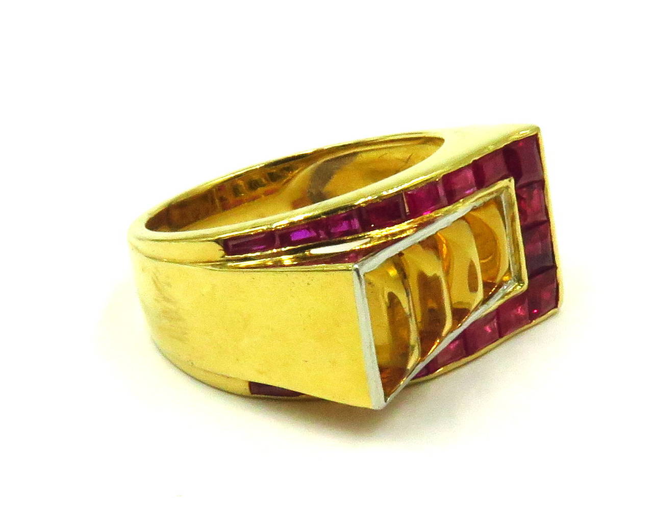 This ring has great lines from every angle. The calibration of both the rubies and the citrines are graduated perfectly. This ring is a size 8 1/4.