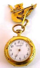 1930s J.E. Caldwell Pearl Ruby Diamond Gold Griffin Watch Pin with Watch