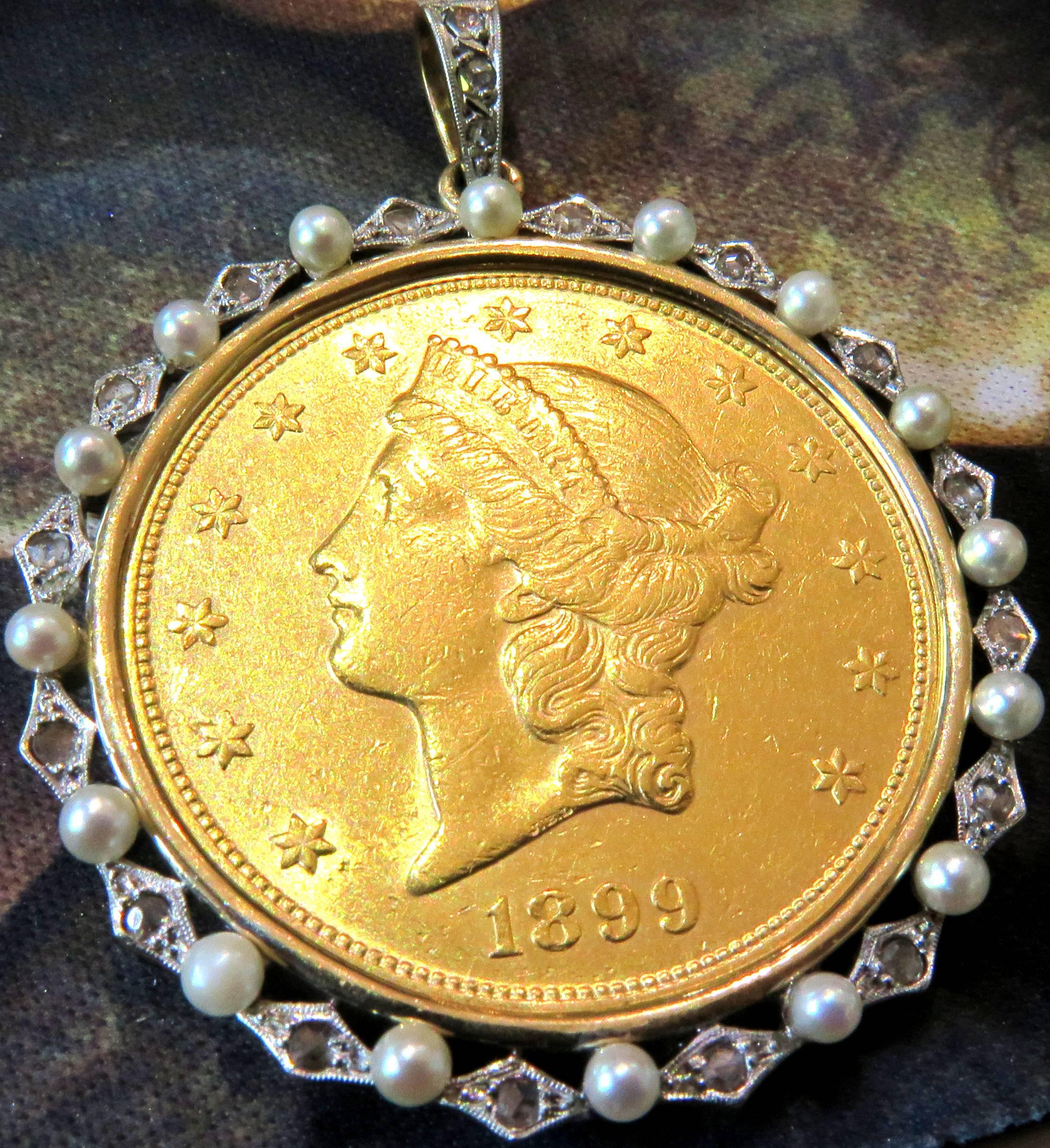 This Edwardian period framed twenty dollar gold piece is a timeless classic!
The frame is platinum topped and gold back. The coin is surrounded with rose cut diamonds and natural pearls. This $20- gold piece is dated 1899.
This piece weighs 42.9