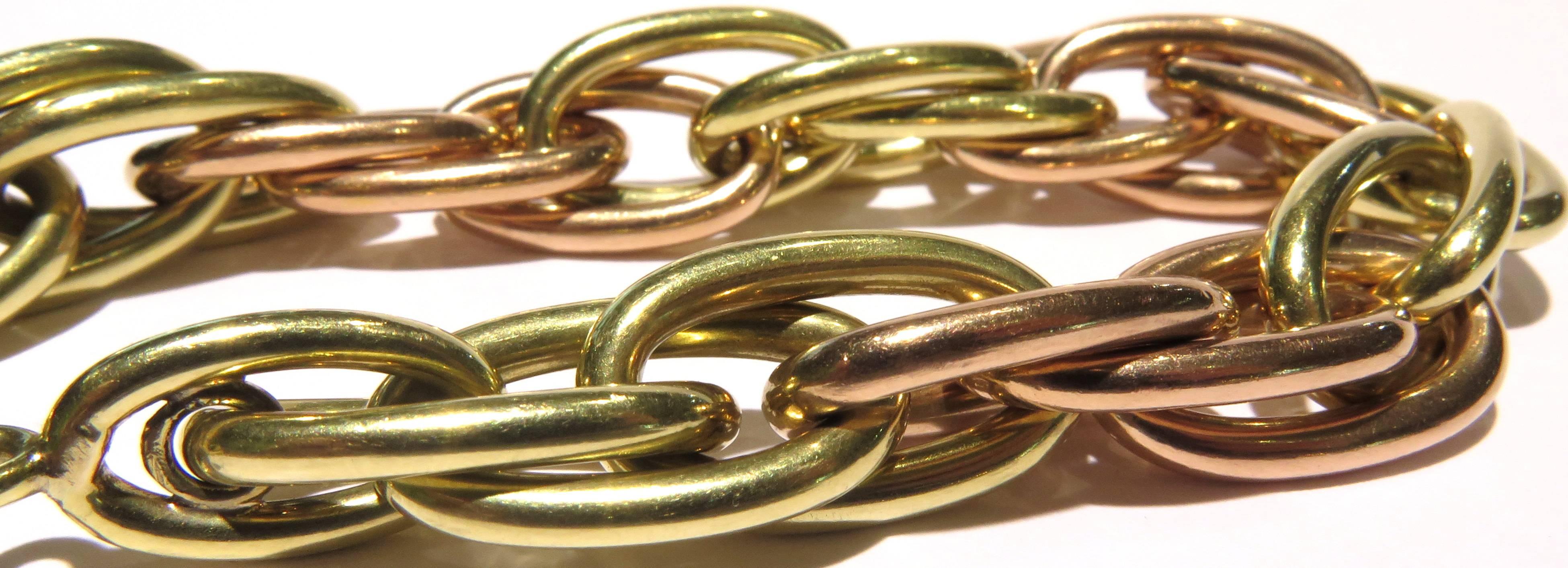 This 14k oversized intertwined oval hollow link bracelet is sure to get you many compliments! This retro bracelet with it's rose & yellow gold links is a real stunner and a perfect example of 1940's jewelry.
This bracelet weighs 35.9 grams
This