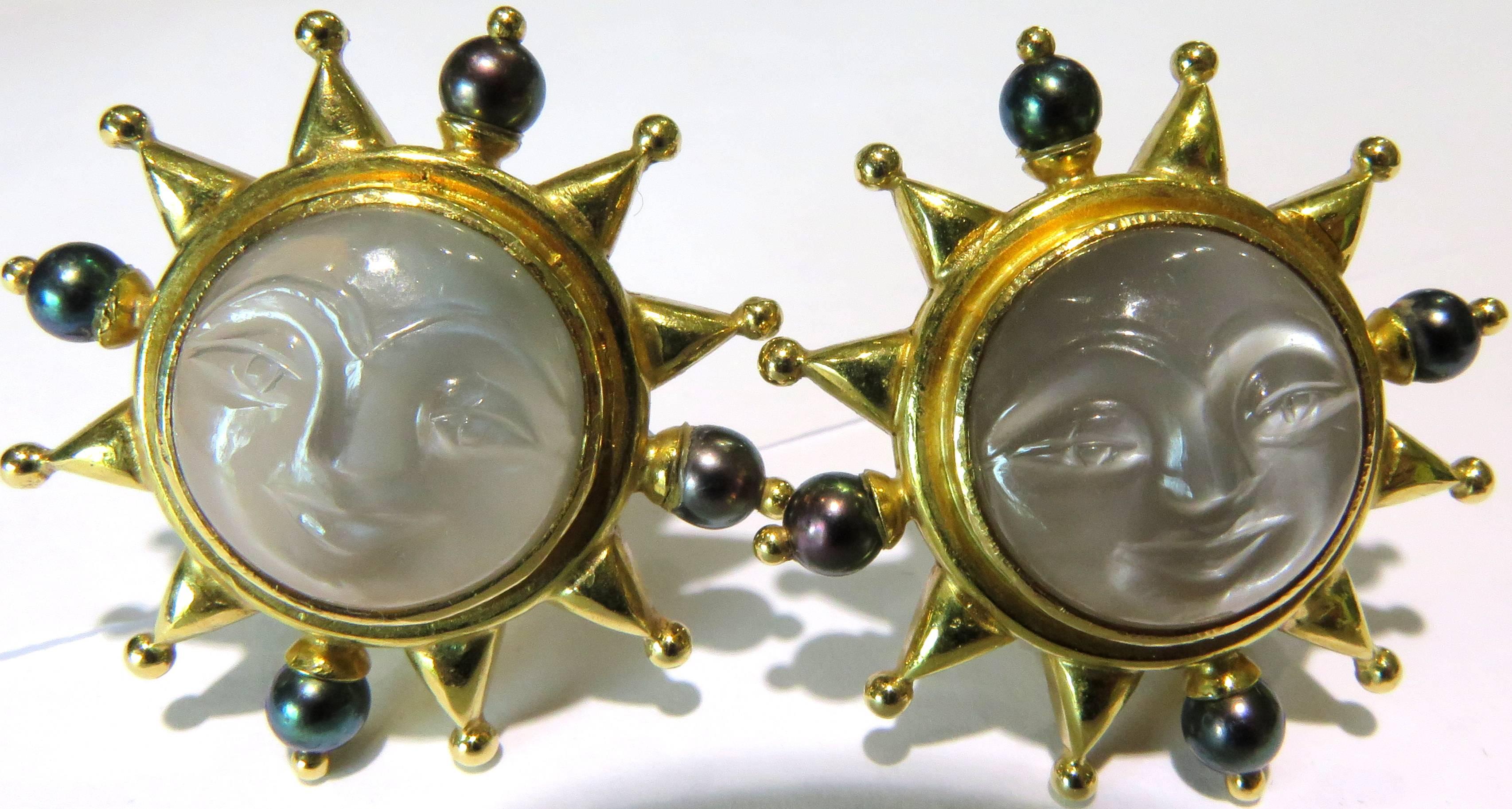 These Elizabeth Locke carved moonstone earrings are my favorite of all her pieces. I love how the black pearls are positioned like the directions of a map. These earrings are 18k gold and have the intertwined EL mark, for Elizabeth Locke. These