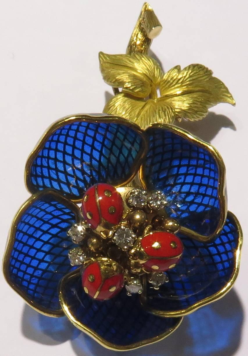 This elegant 18k French pin is signed with a M.L France + has touch marks on the pin/clasp.
The enamel on this pin is perfect from the front. On the back, 3 of the petals are damaged on the base (*see image 6), but it is not detectable from the