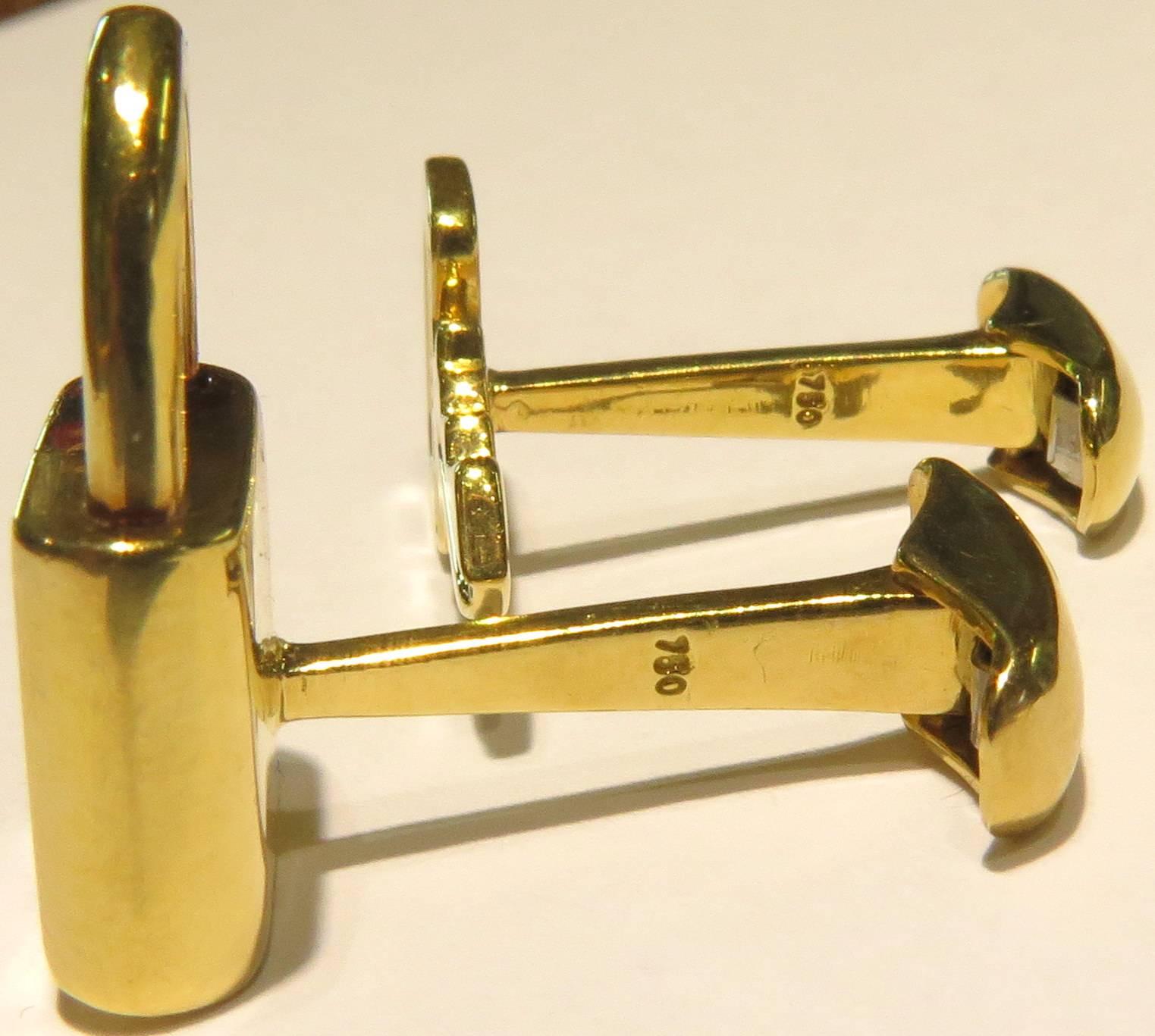 These 18k Louis Vuitton classicly fun lock & key cufflinks have a spring lever to made putting on a breeze. They can easily be worn by men or women. 
These cufflinks weigh 10.7 grans
The lock on these cufflinks measure 13/16 inch high by 1/2 inch