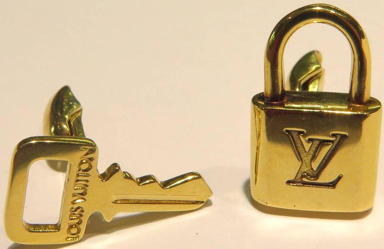 Louis Vuitton Gold Lock and Key Cufflinks For Sale at 1stdibs