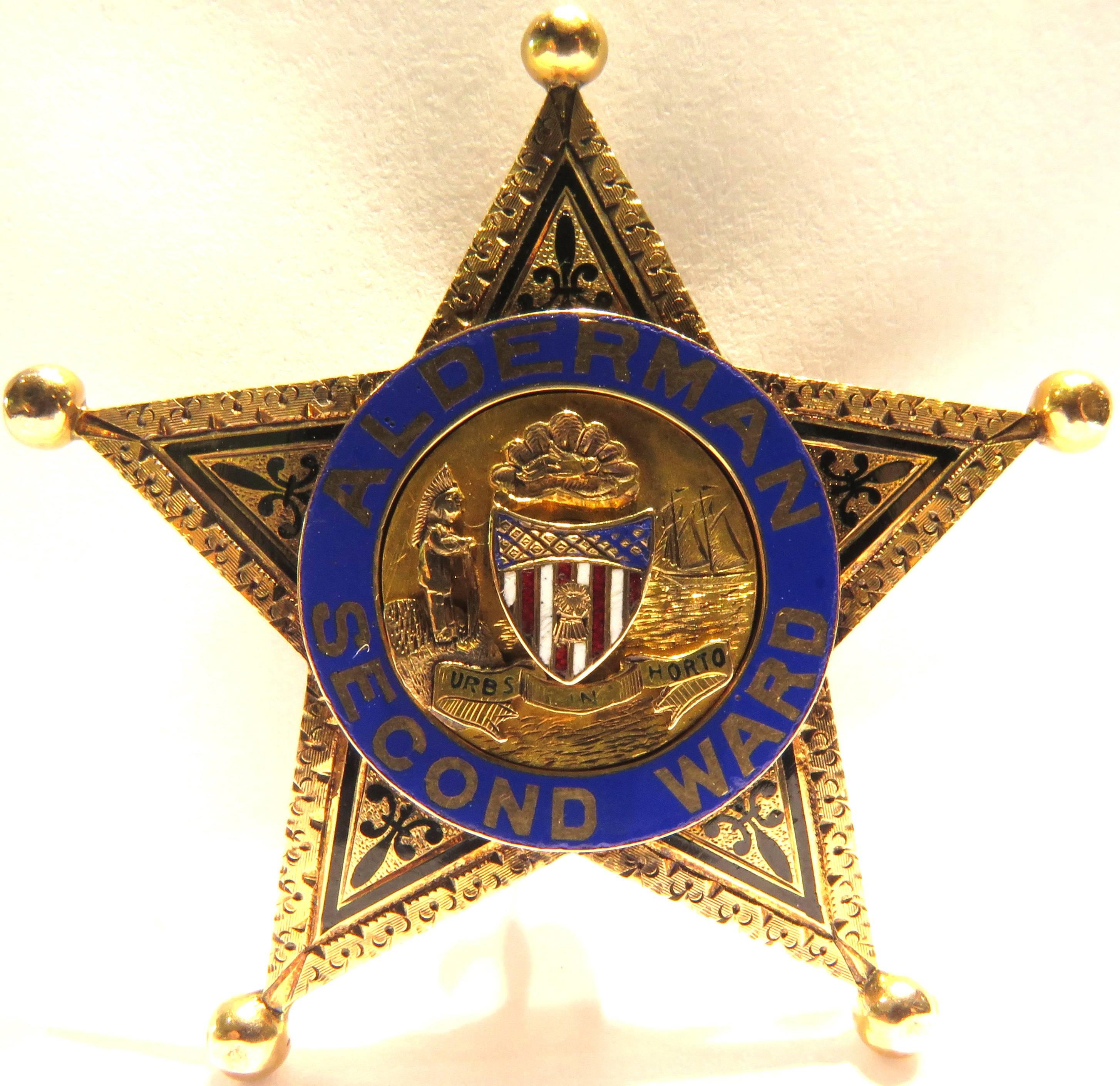 This extremely rare 14k gold Alderman police badge is perfect for even the most finicky of collectors. Under the city crest is a ribbon with the words "Urbs in horto". In the 1830s, Chicago's emerging government adopted the motto