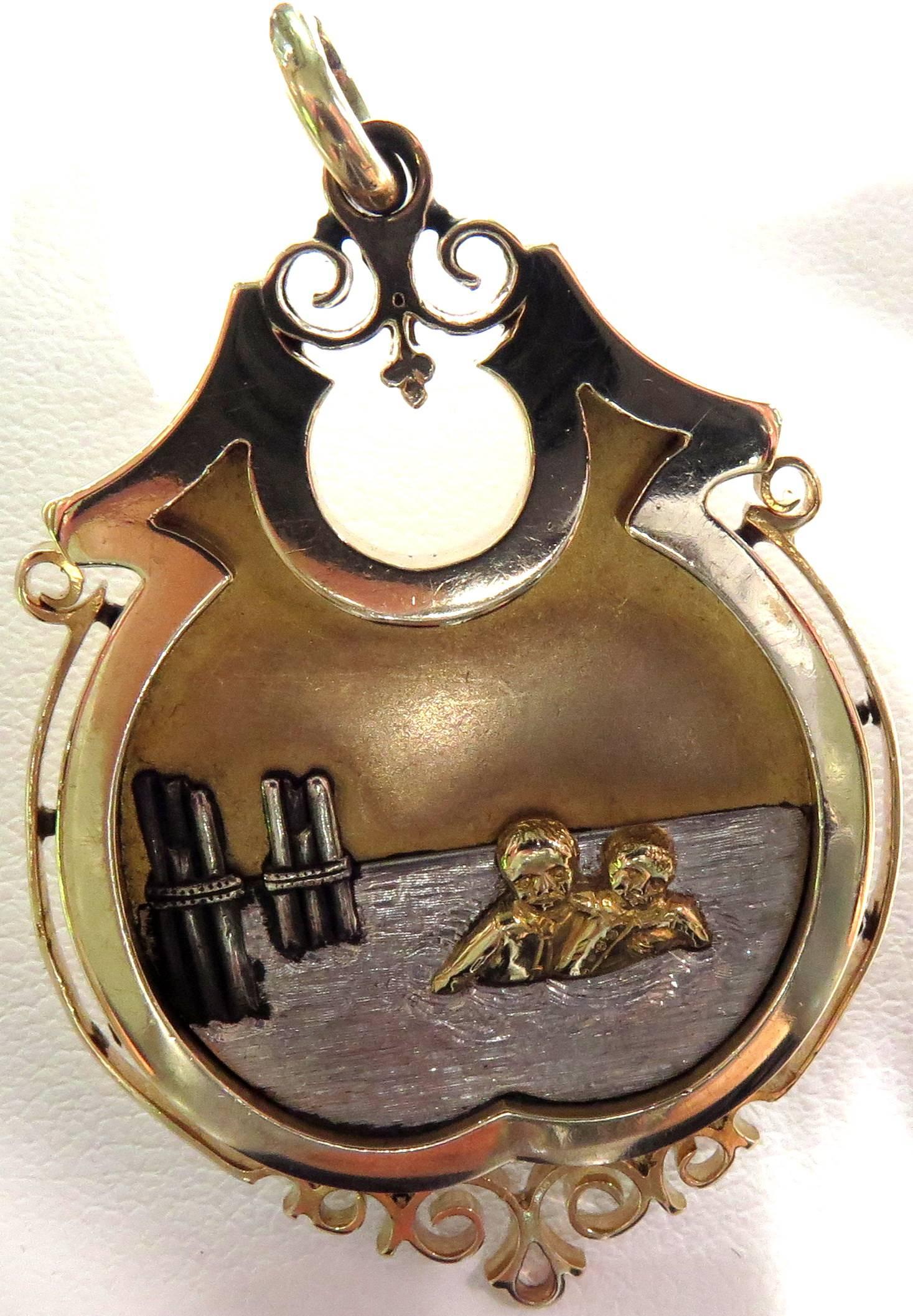 This incredibly detailed 14k Gold Medal was awarded to Howard Soule for his heroism in rescuing Willie Pomeroy form drowning in the river at Rush St. bridge April 22, 1892.   On the front of this medal is a scene depicting the rescue of Willie