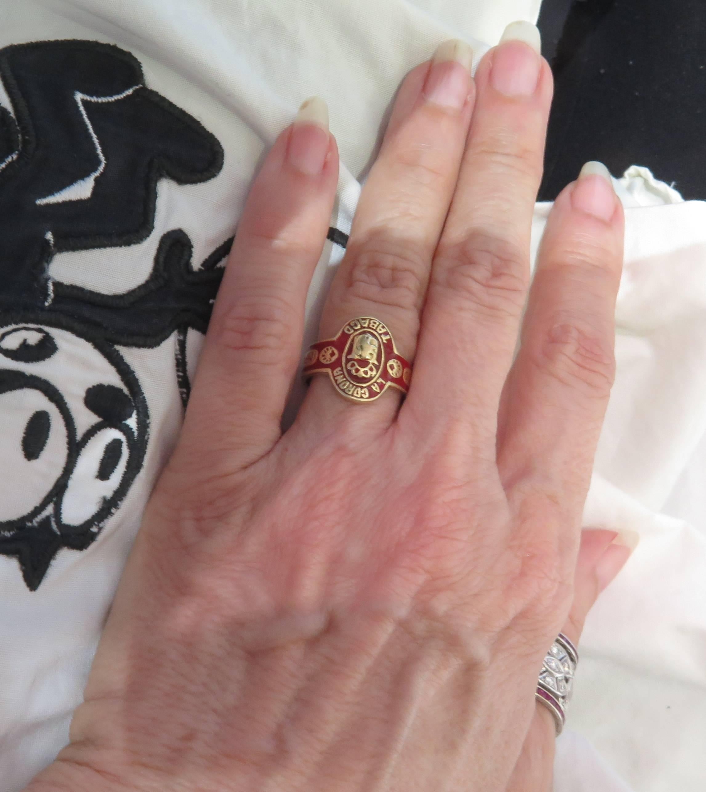 This romantic cigar band ring brings back memories of Lucy and Ricky. The front of this ring says La Corona Tabaco around a lion standing on 2 legs. Each side of this cigar band says Importato. This ring is so comfortable to wear that you will