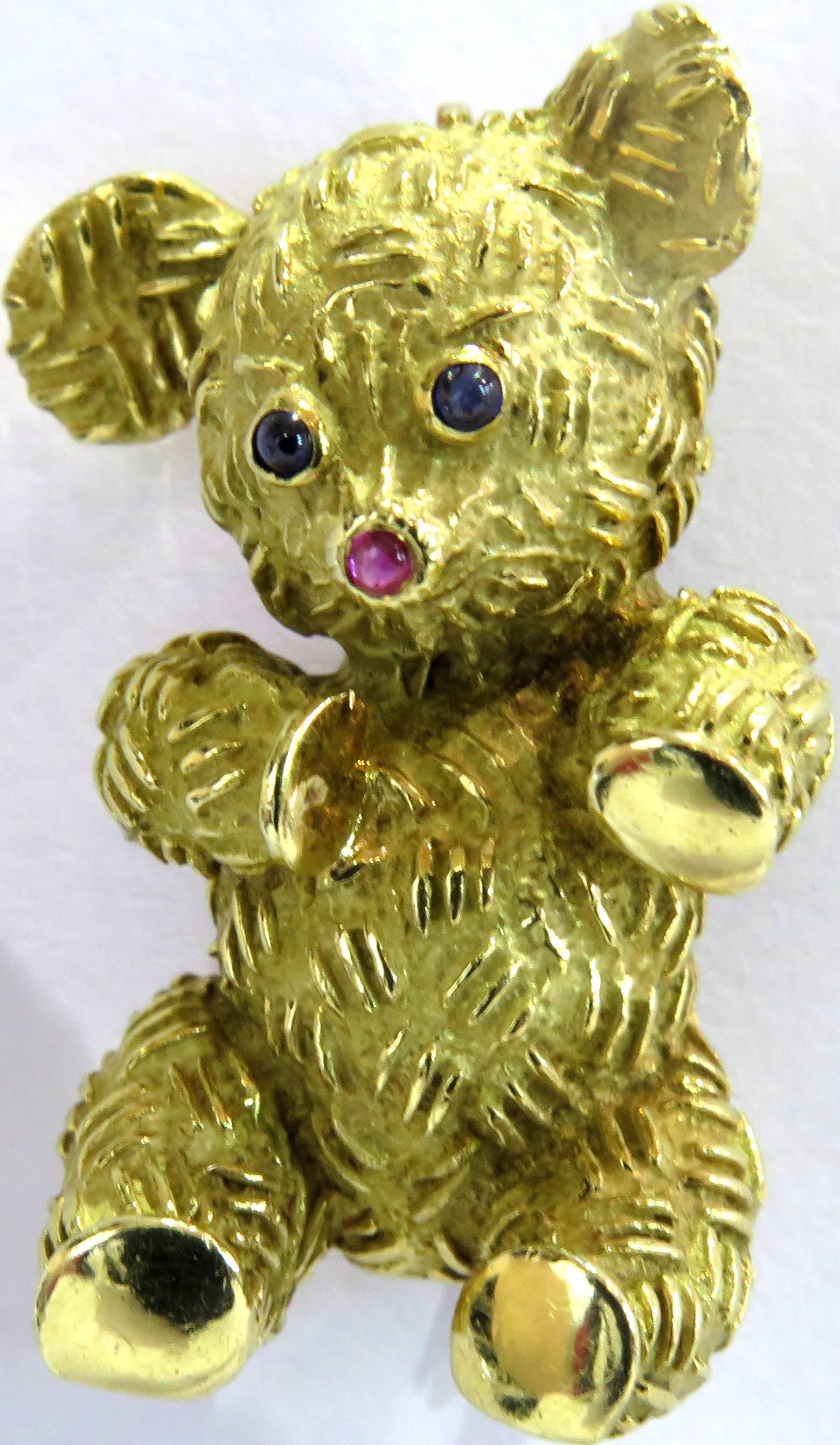 It's true, this is the cutest 18k Teddy Bear pin you just won't want to leave behind. He has 2 cabochon sapphire bezel set eyes and ruby 