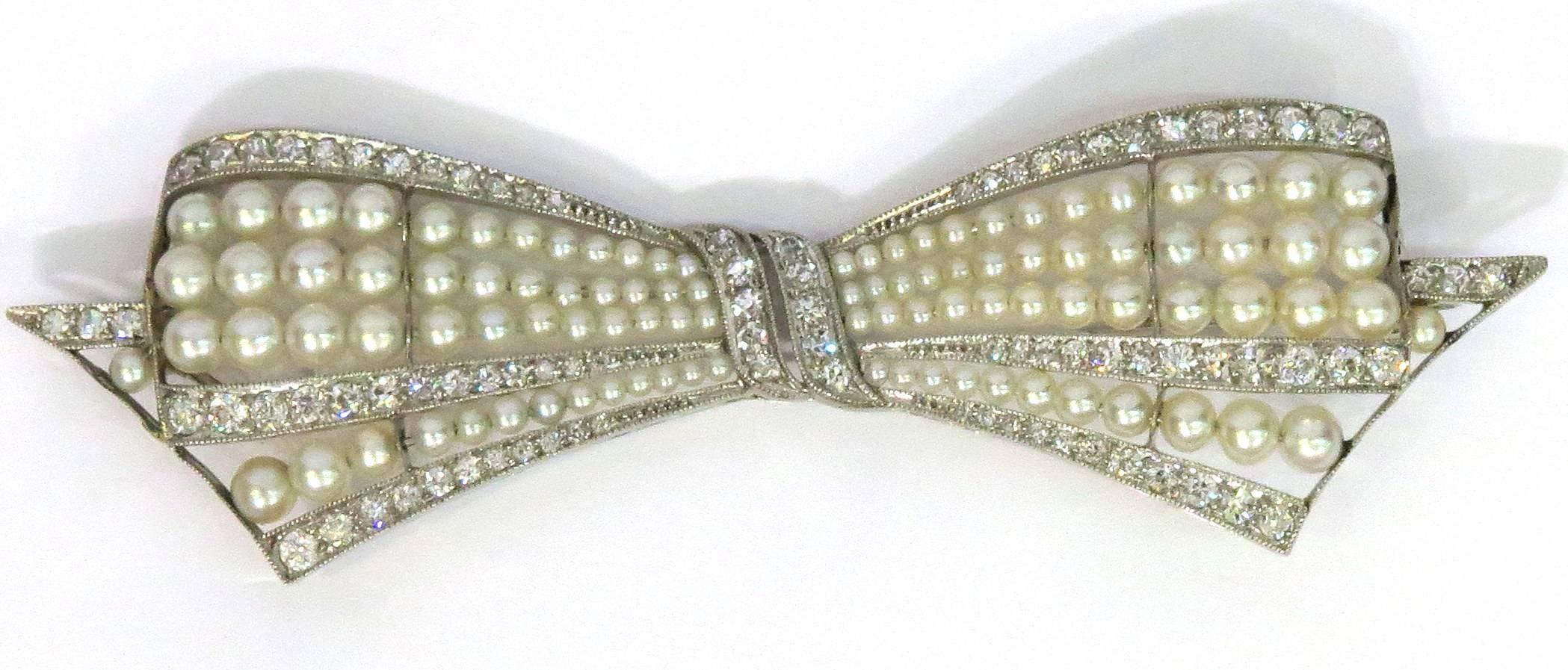 Exquisite Art Deco Natural Pearl Diamond Platinum Bow Pin For Sale 1