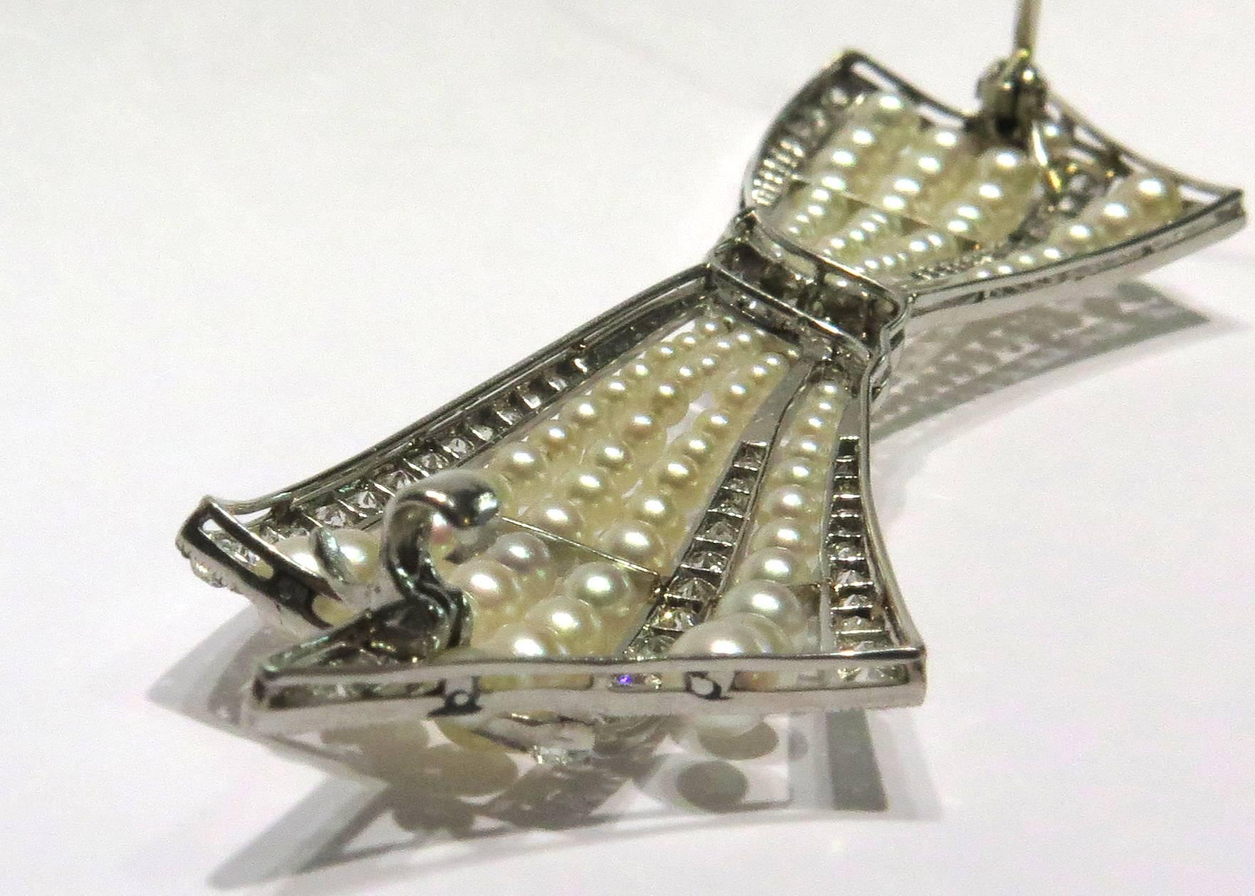 Exquisite Art Deco Natural Pearl Diamond Platinum Bow Pin For Sale 2