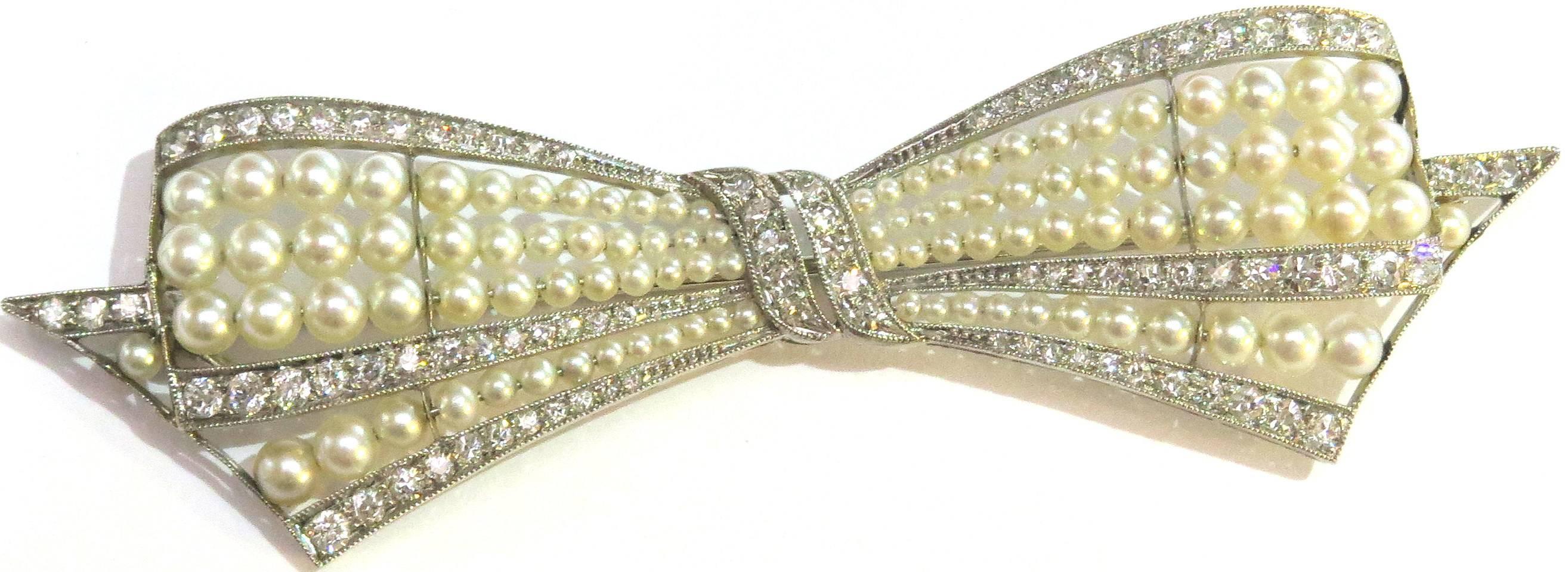 Exquisite Art Deco Natural Pearl Diamond Platinum Bow Pin For Sale 4
