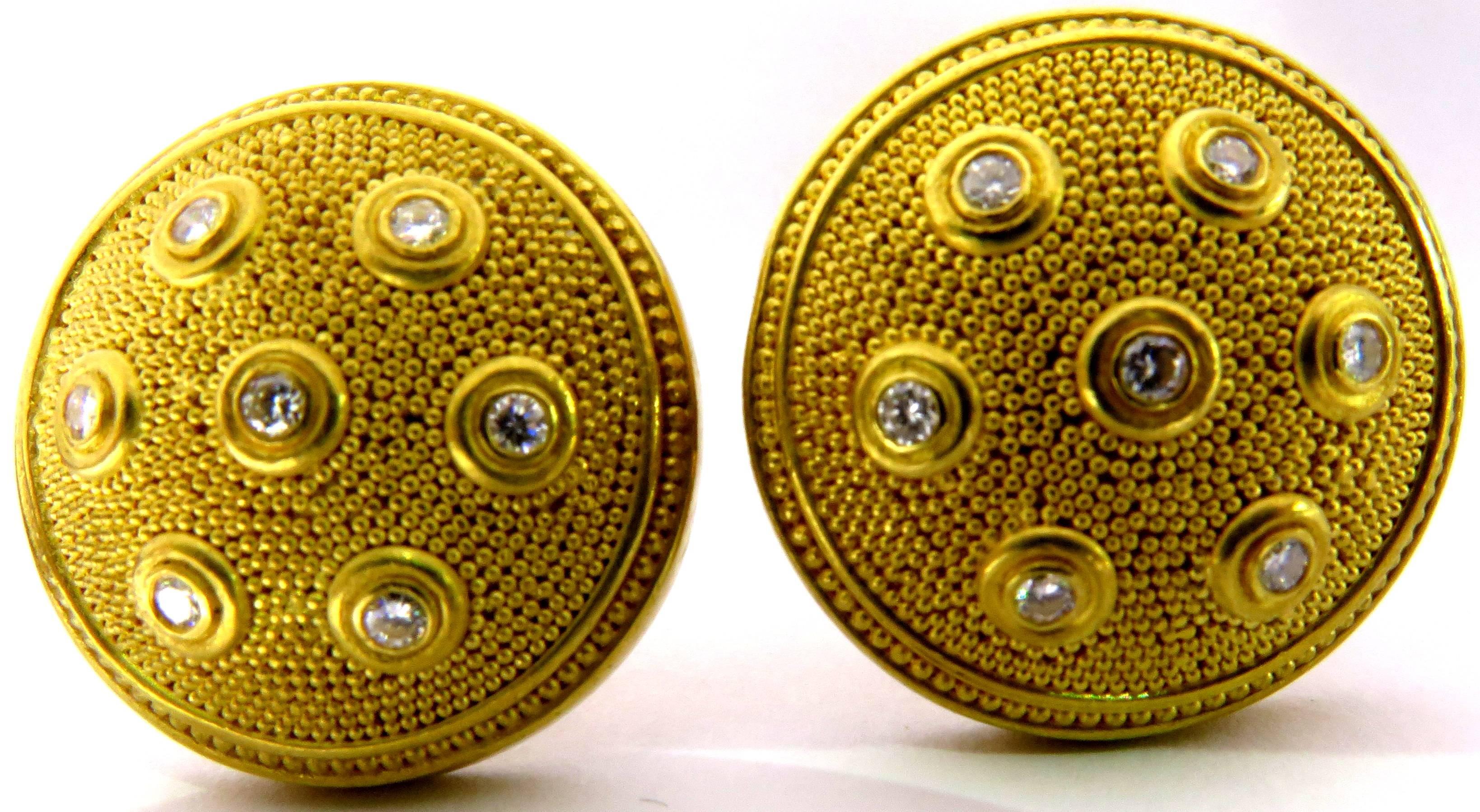 These Reinstein Incredibly well made Reinstein Ross earrings are set in 22k gold with 14 bezel set diamonds. Each tiny bead is individually soldered. These earrings are truly a work of art..These lever back earrings can easily be converted to