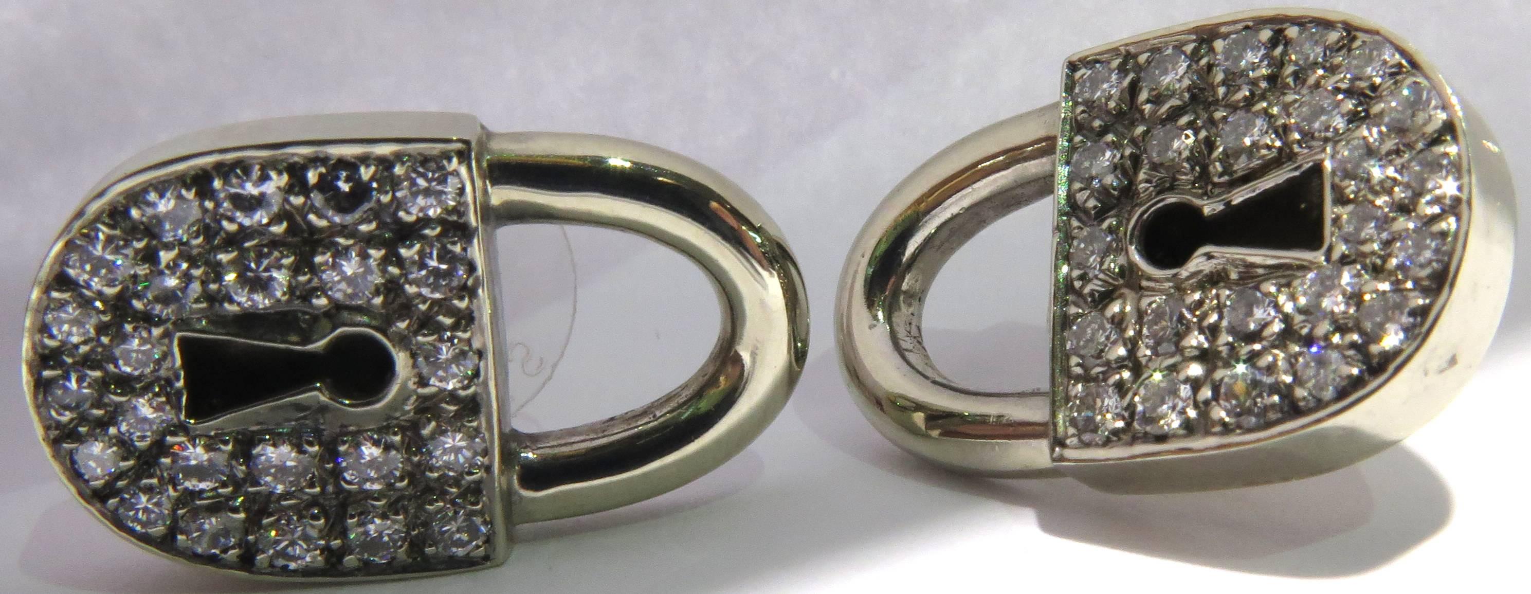 Unique Diamond White Gold Post Lock Motif Earrings In Excellent Condition For Sale In Palm Beach, FL