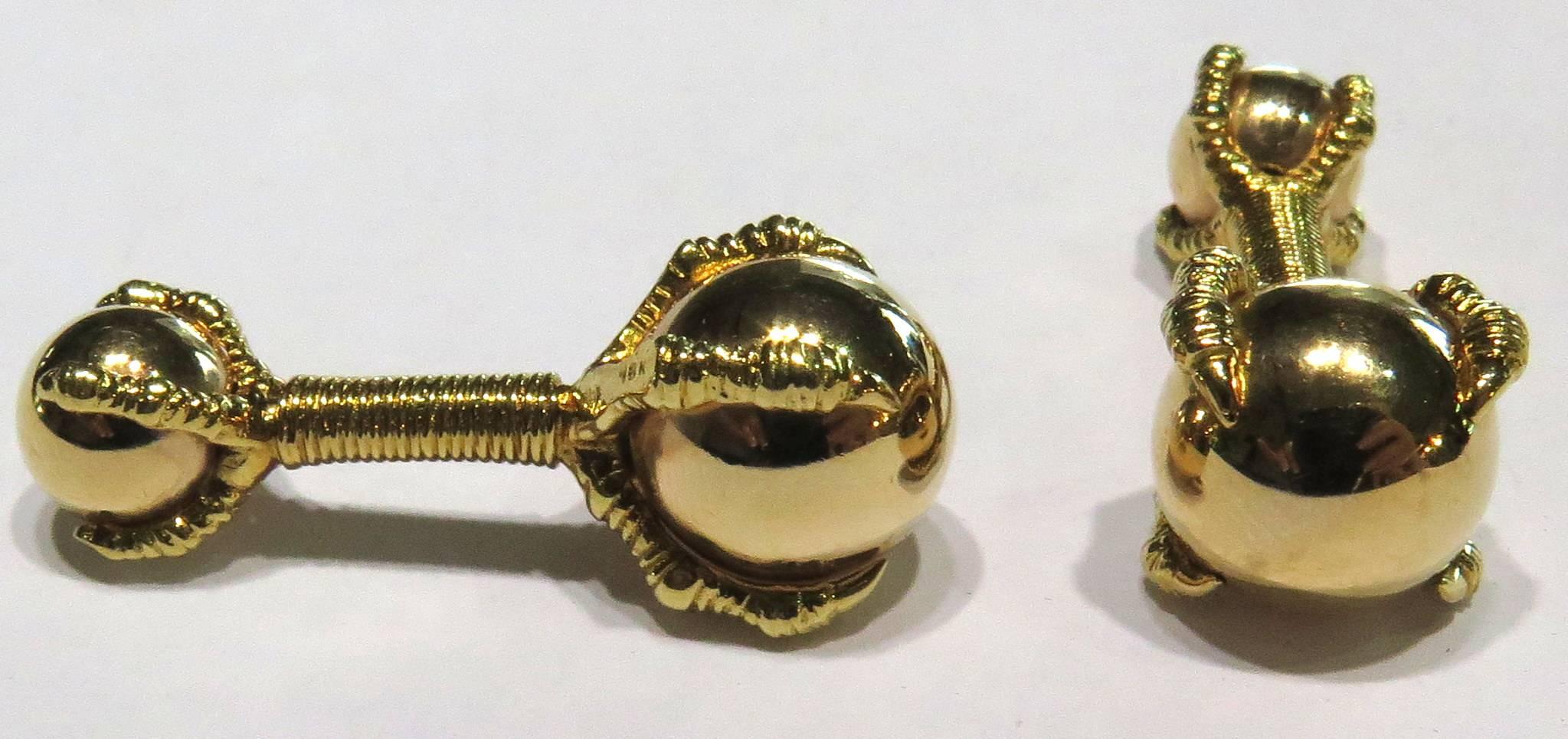 These incredible Tiffany France 18k gold cufflinks will always get you compliments! Each cufflink has a claw grasping a ball, one side larger than the other.  Dress them up or down, they will absolutely complement any shirt.
These cufflinks measure