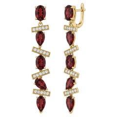 Orecchini pendenti moderni con granati dal design geometrico, argento, oro