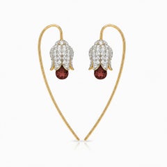 Silver, gold Lily flower earrings with garnet briolettes