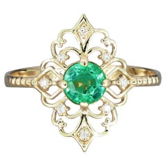 Used 14 K Gold Ring with Emerald and Diamonds