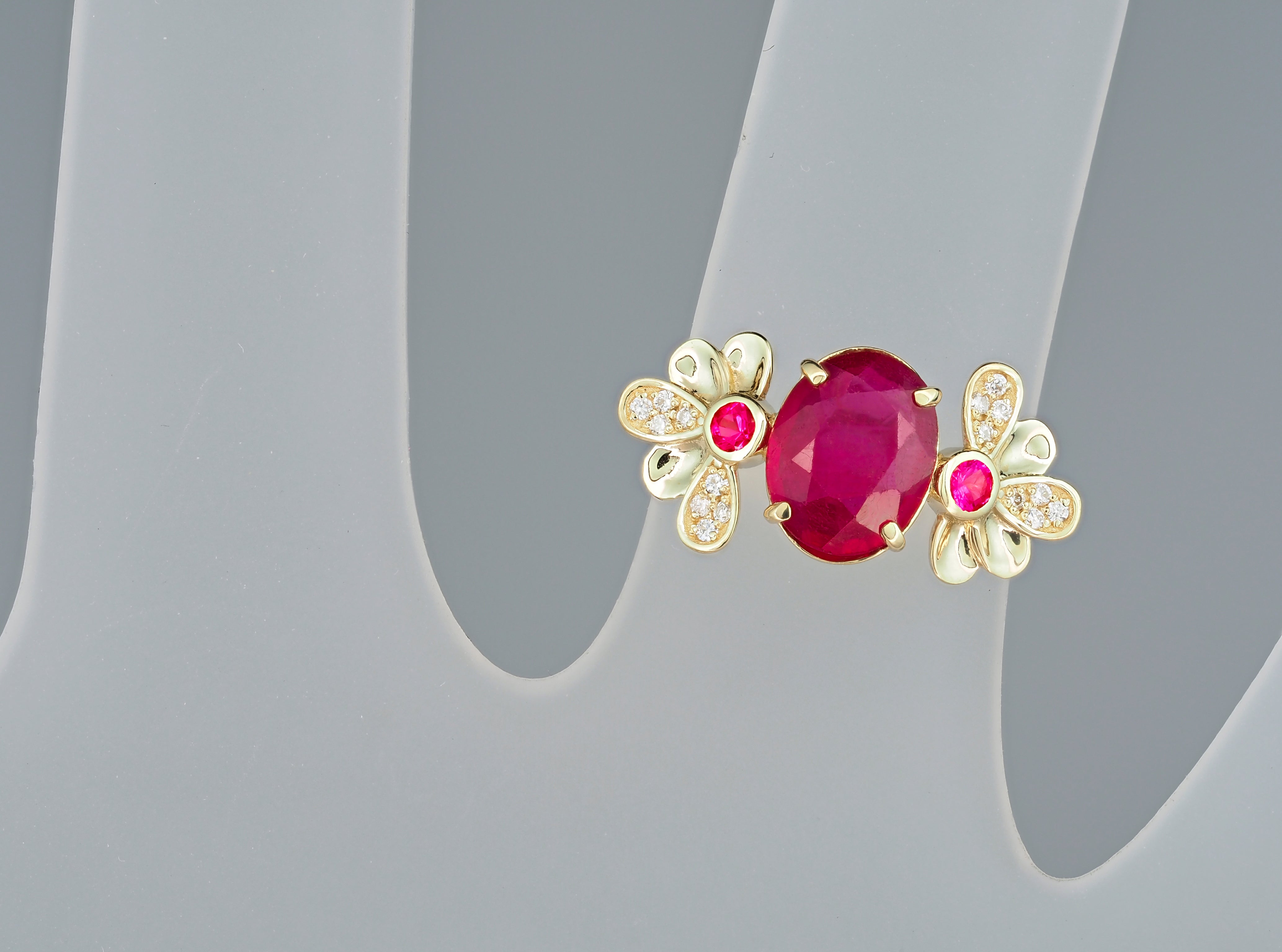 For Sale:  14 Karat Gold Ring with Ruby and Diamonds. Flower design ruby ring