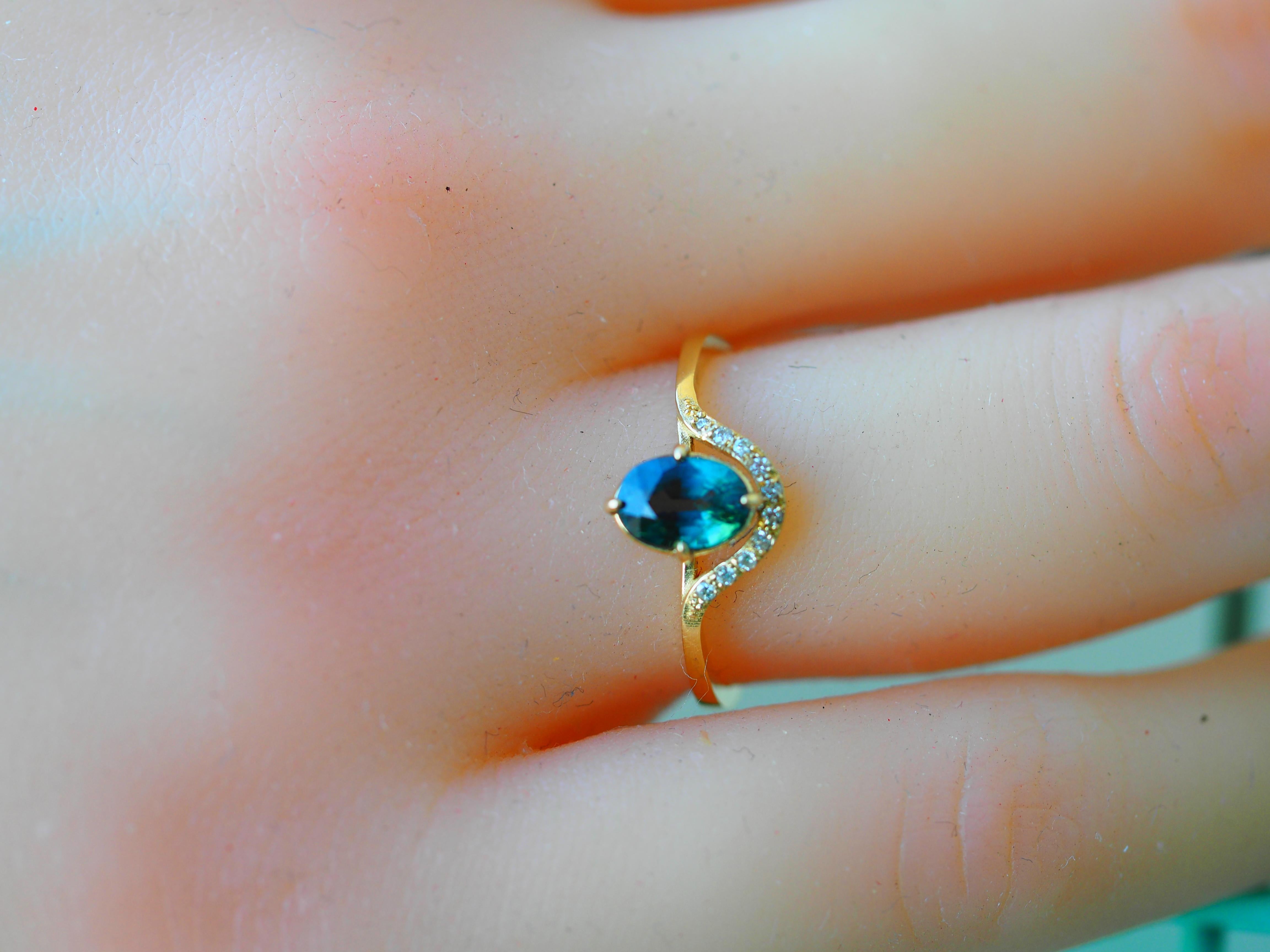14 Kt Gold Ring with Sapphire and Diamonds 12
