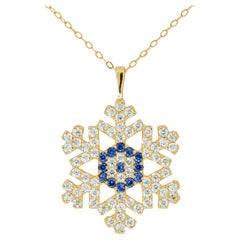 Snowflake charm necklace in 14k solid gold. Gold Snowflake Pendant. 