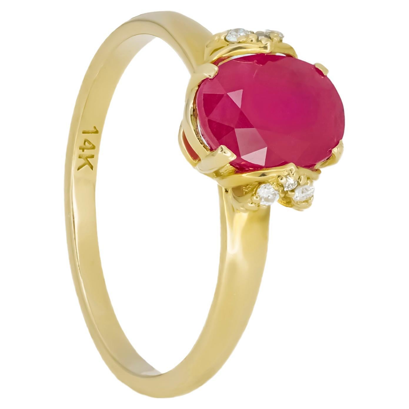 14 kt solid gold ring with natural ruby and diamonds. July birthstone.
Weight approx. 2.2 g. depends from size

Central stone: Natural ruby
Weight: approx. 1.2- 1.4 ct, oval cut.
Clarity: Transparent with inclusions
Surrounding stone:
Diamonds: