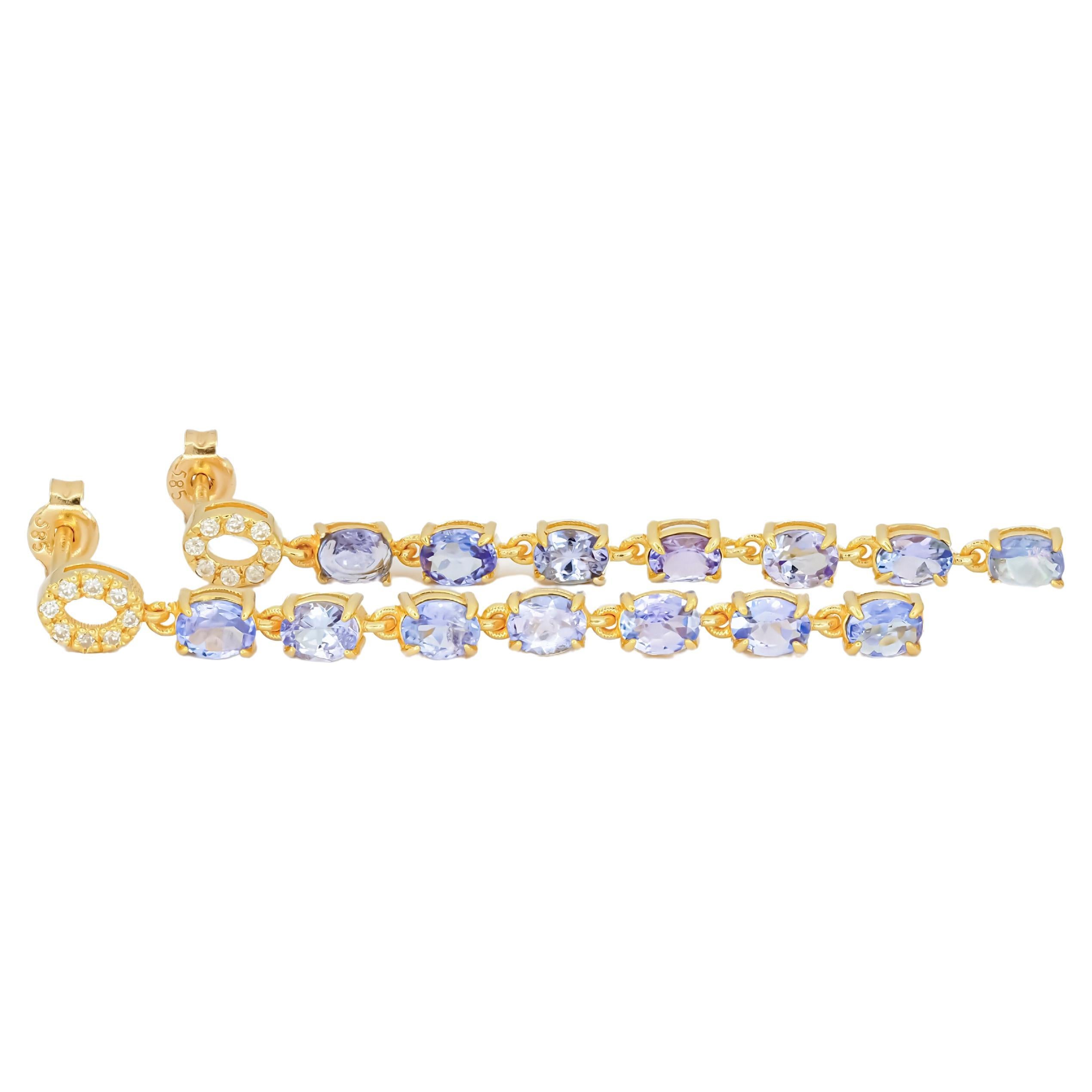Tanzanite dangle earrings studs in 14k gold. For Sale