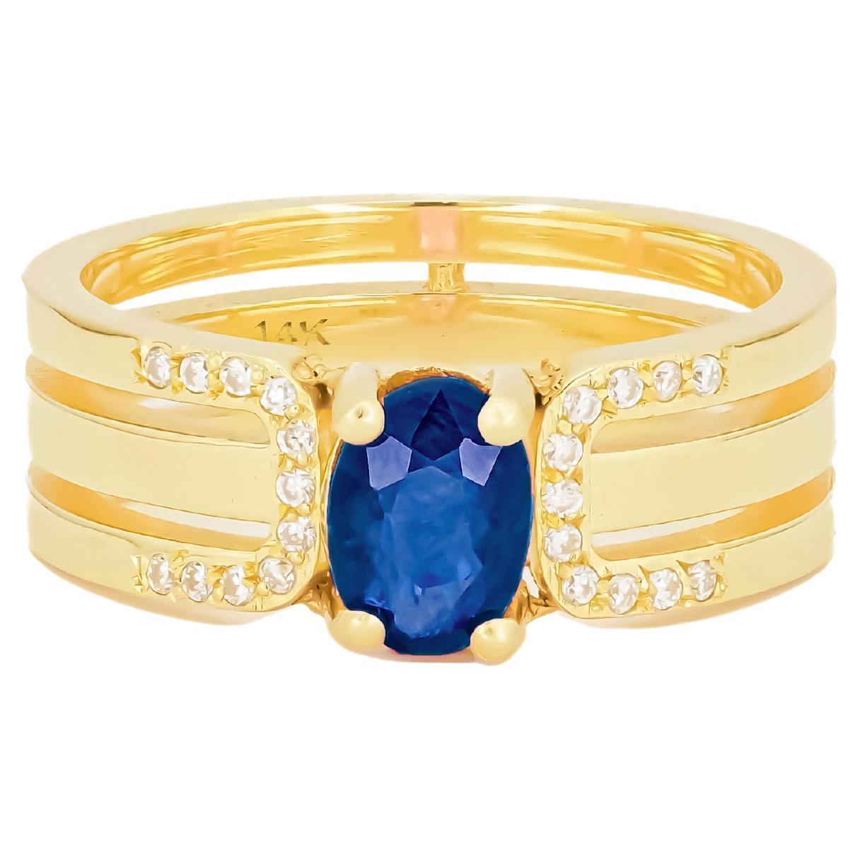 For Sale:  14 K Gold Mens Ring with Sapphire.