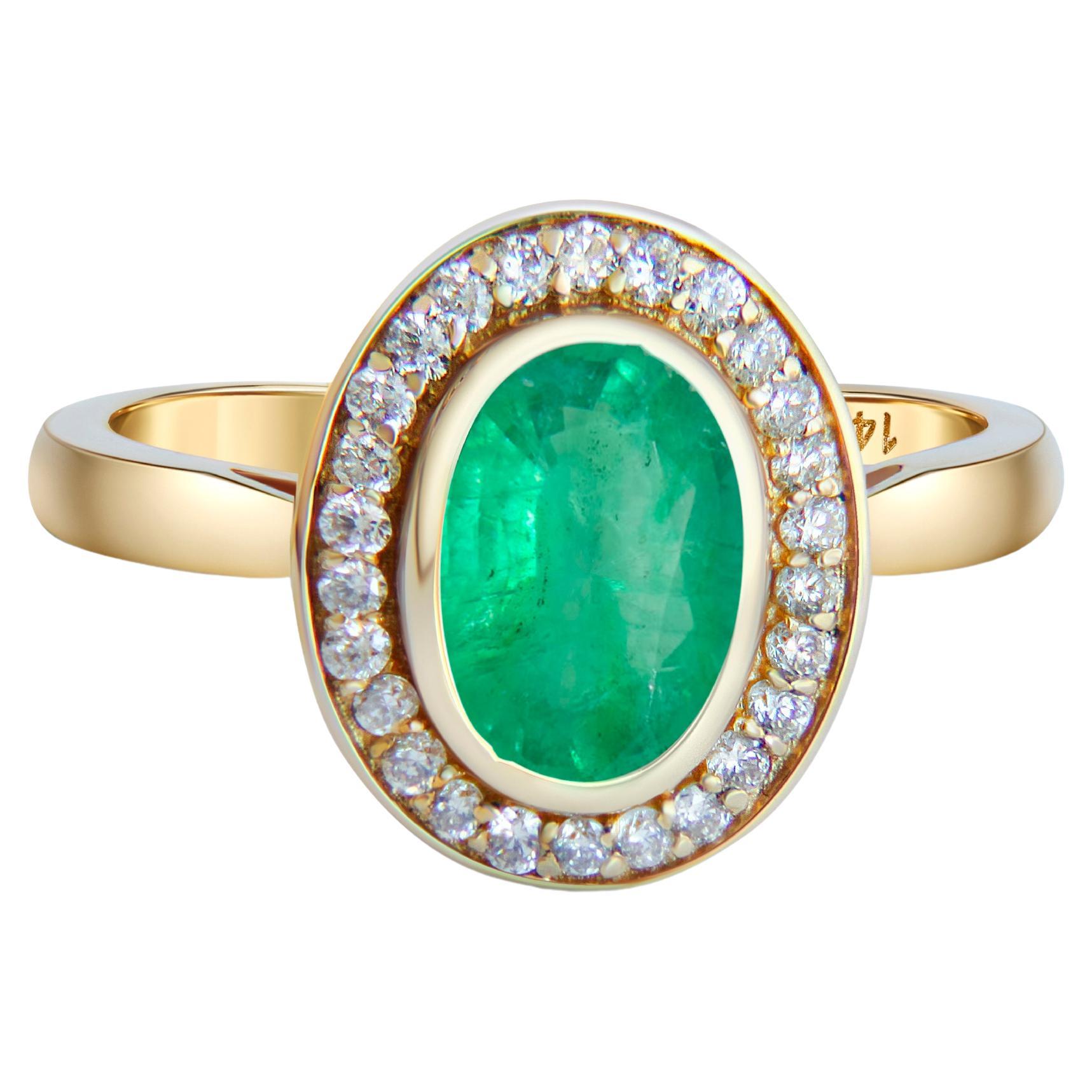 Smaragd und Diamanten 14k Goldring.