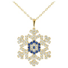 Snowflake charm necklace in 14k solid gold. Gold Snowflake Pendant.