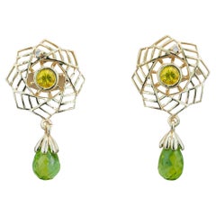 Orecchini con peridoti, zaffiri e diamanti