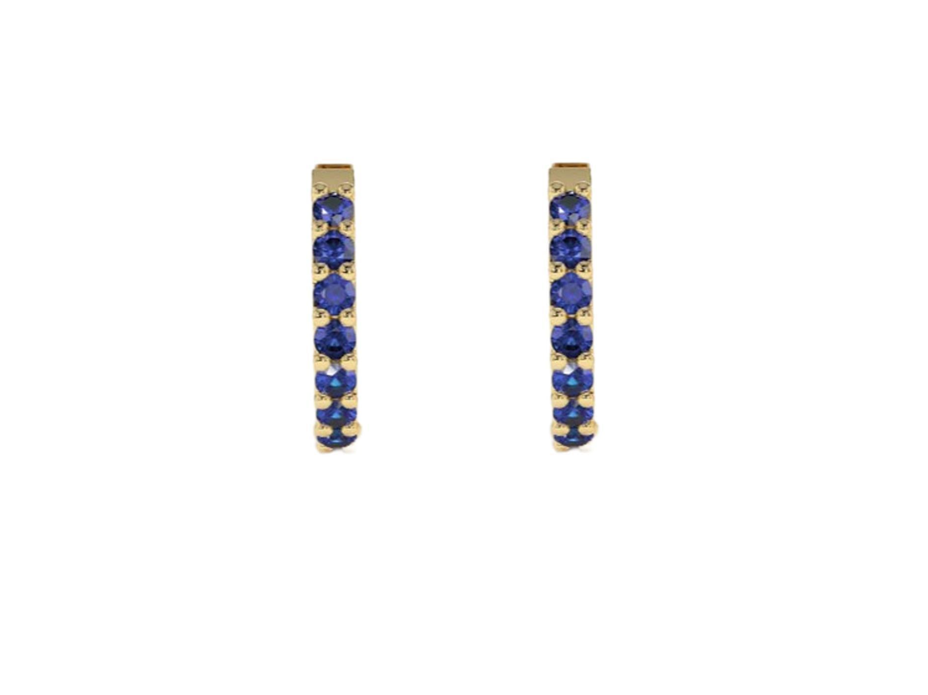 Orecchini a cerchio con zaffiri. 

Metallo: argento 925
Dimensioni dell'orecchino:
Il diametro interno degli orecchini: 10MM
Il diametro esterno degli orecchini: 12MM
Peso: 2,2. g.

Pietre preziose:
Zaffiri: 14 pezzi, taglio rotondo, blu  colore,