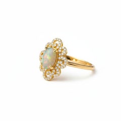 14k Goldring mit ovalem Opal-Cabochon