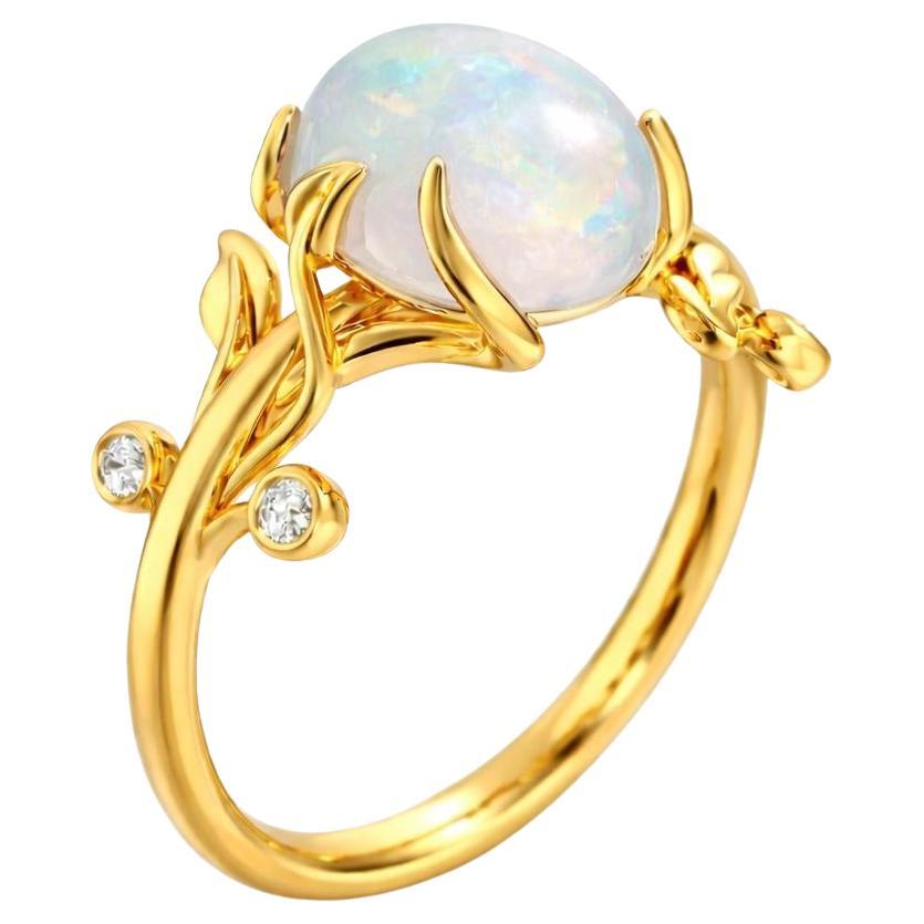Oval cab opal ring in 14k gold