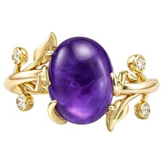 Anello con ametista a cabina ovale in oro 14k