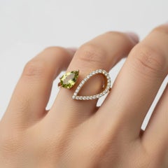 Pear peridot 14k gold ring