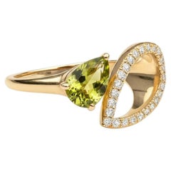 Pear peridot 14k gold ring