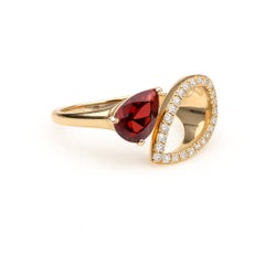 Pear garnet 14k gold ring