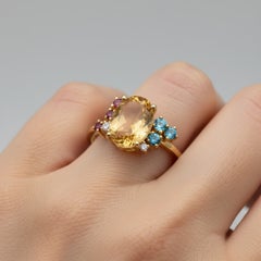 Blue topaz multicolor ring in 14k gold