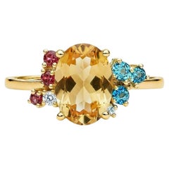 Blue topaz multicolor ring in 14k gold