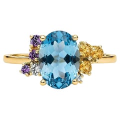 Blue topaz multicolor ring in 14k gold