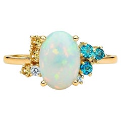 White opal multicolor ring in 14k gold